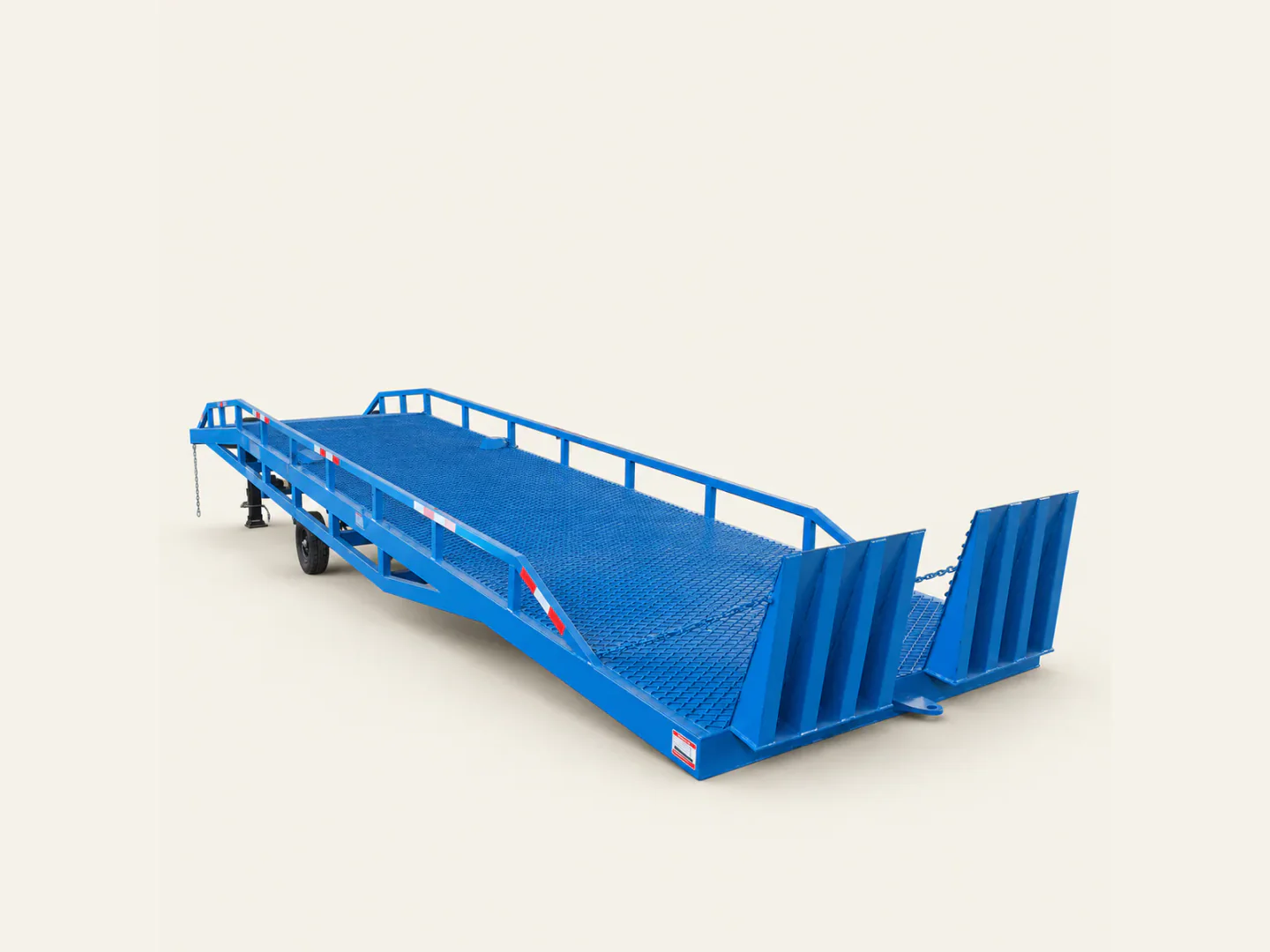 Complete blue mobile yard ramp in a three-quarter view on a warm off-white background