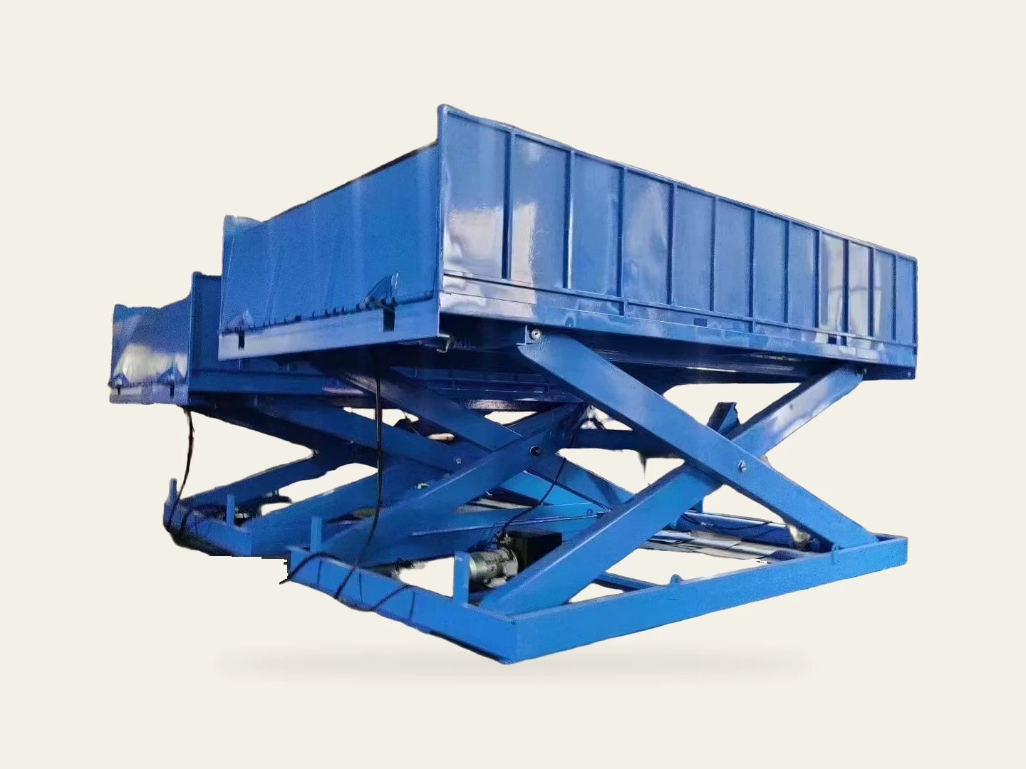 Complete blue fixed scissor lift table showing its platform, scissors and base