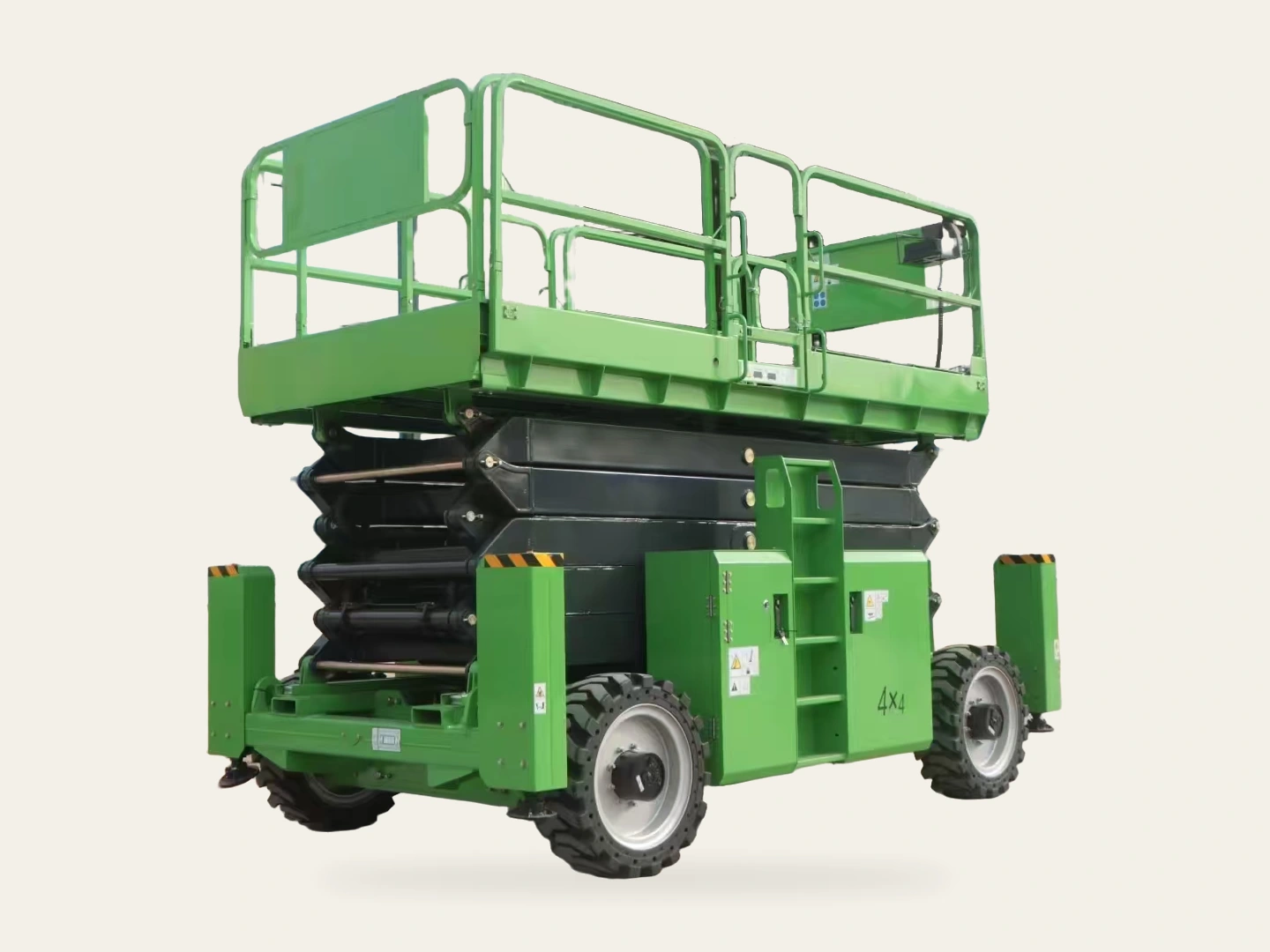 Complete green rough terrain scissor lift showing its platform, folded scissors, tires and stabilizers