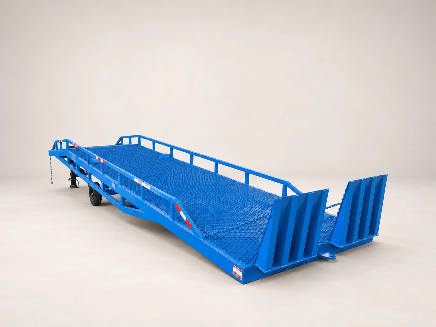 Complete blue mobile yard ramp in a three-quarter view on a warm off-white background
